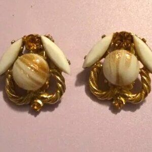 Vintage gold tone fluss milk glass clip on earrings, simulated amber-like stones